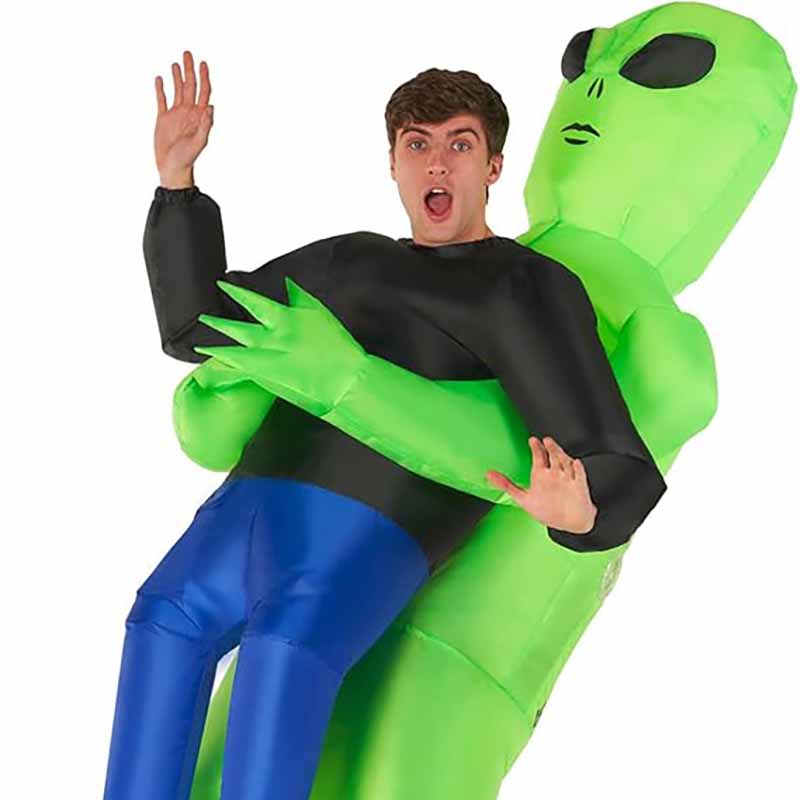 Green ghost hugs people and rides alien inflatable suit