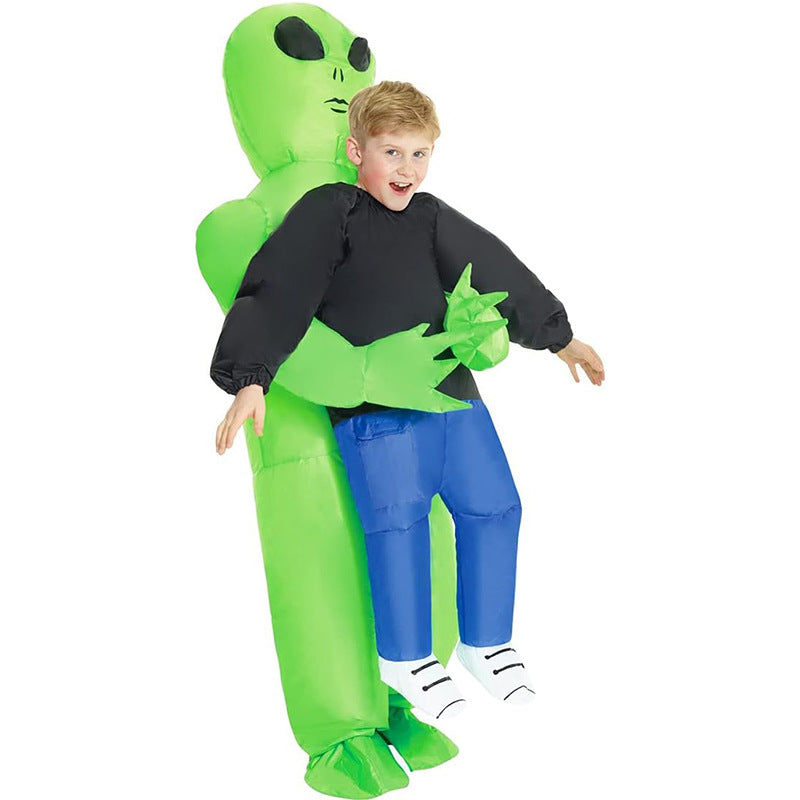 Green ghost hugs people and rides alien inflatable suit