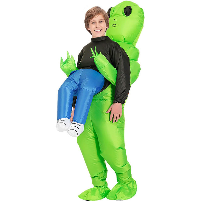 Green ghost hugs people and rides alien inflatable suit