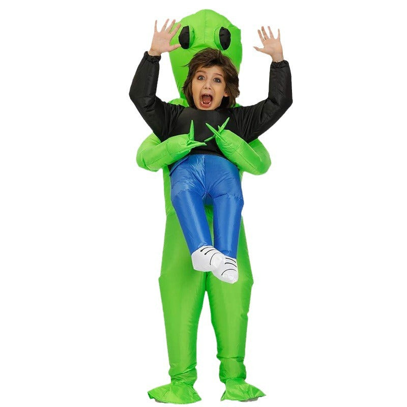 Green ghost hugs people and rides alien inflatable suit