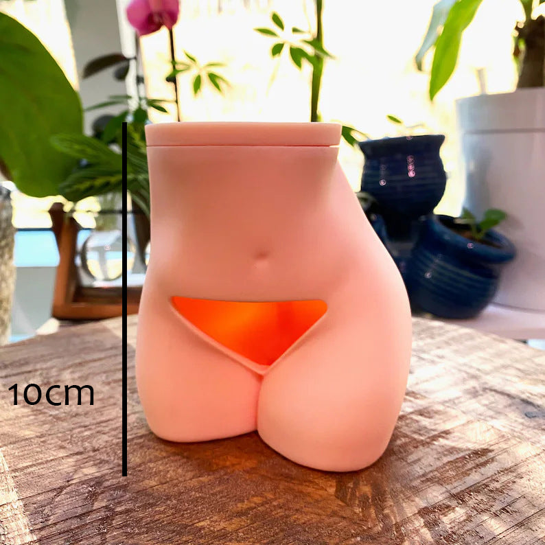 Female body buttocks bush flower pot