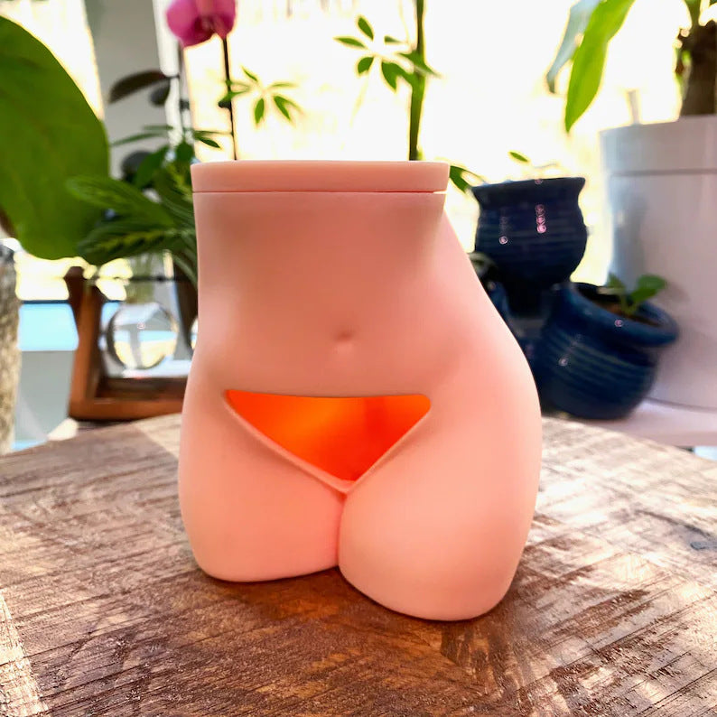 Female body buttocks bush flower pot