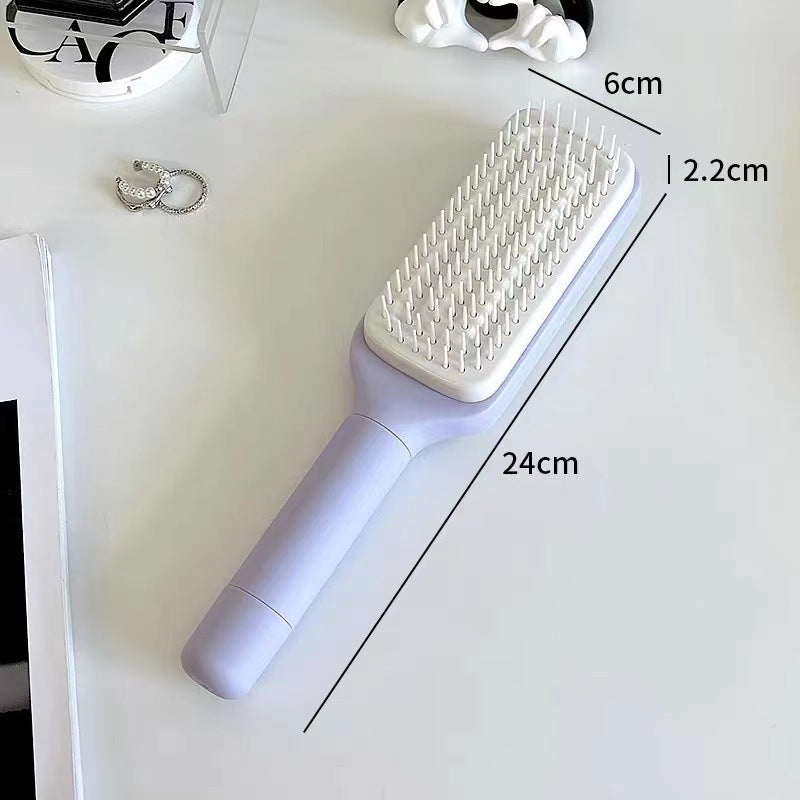 One-touch cleaning retractable massage comb