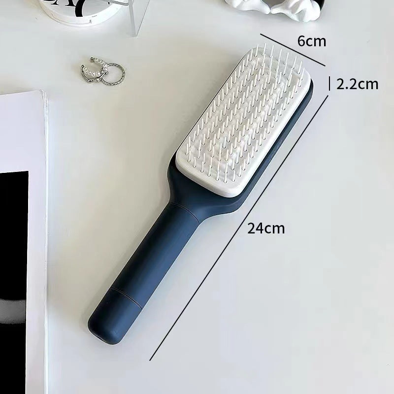 One-touch cleaning retractable massage comb