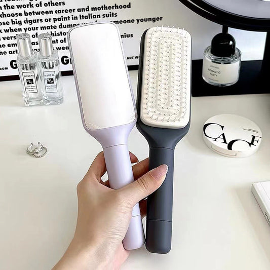 One-touch cleaning retractable massage comb